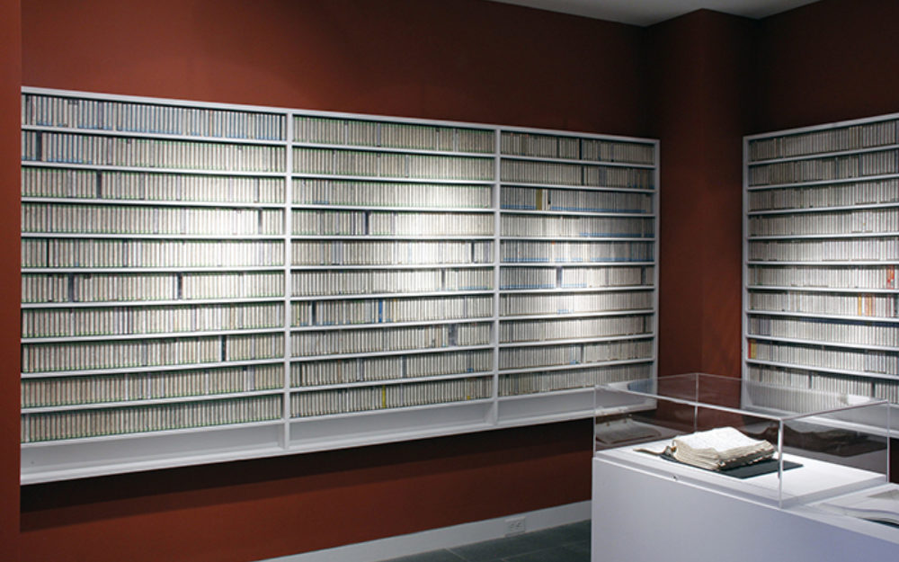 Collection of music in a room with red walls