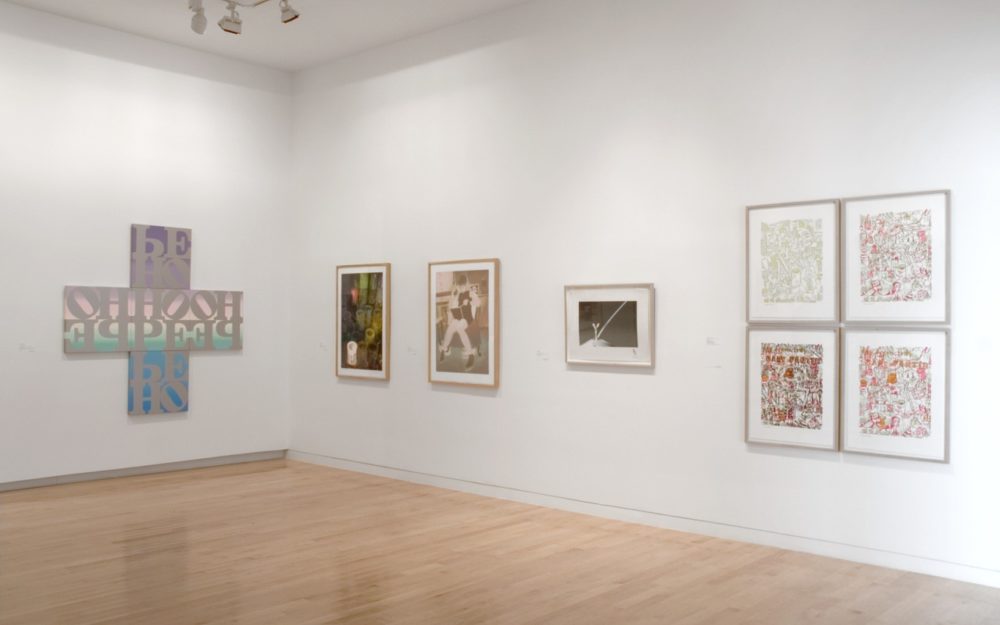 Various screen prints by Gary Lichtenstein hang on the gallery walls