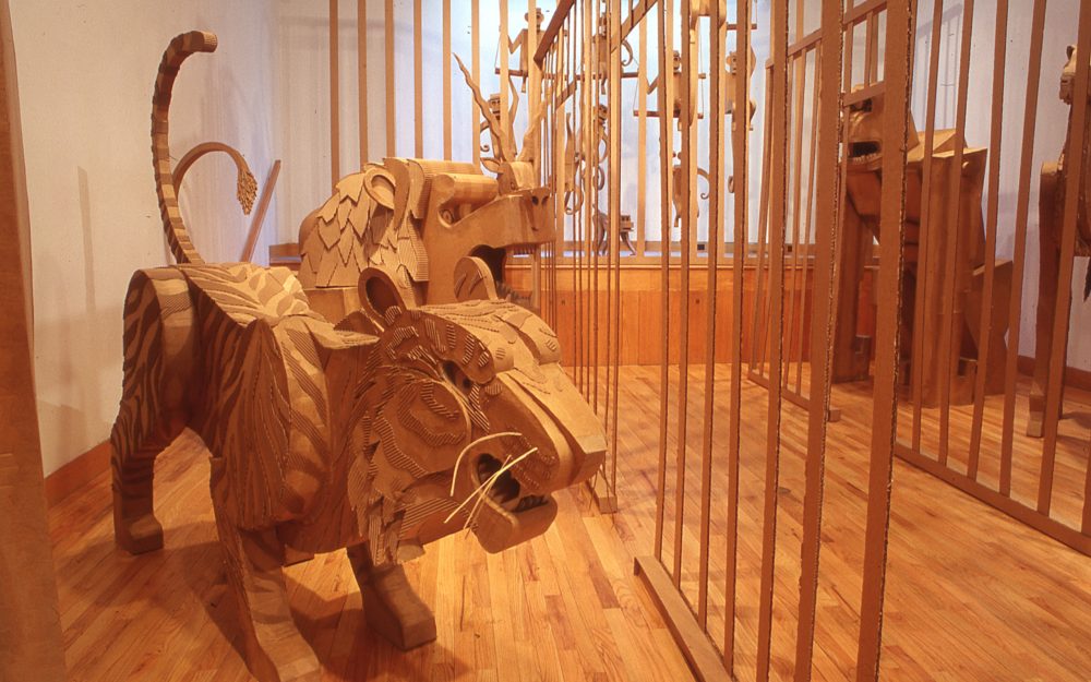 A cardboard tiger and lion