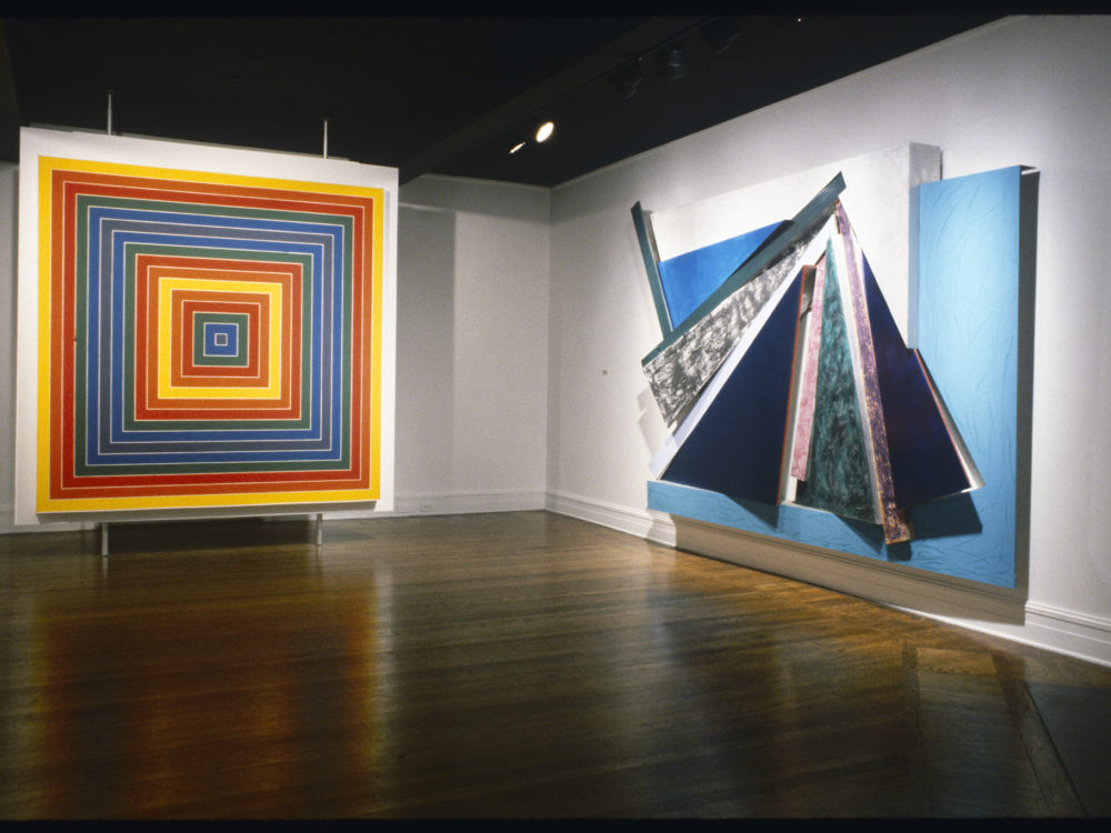 Two large paintings in a gallery