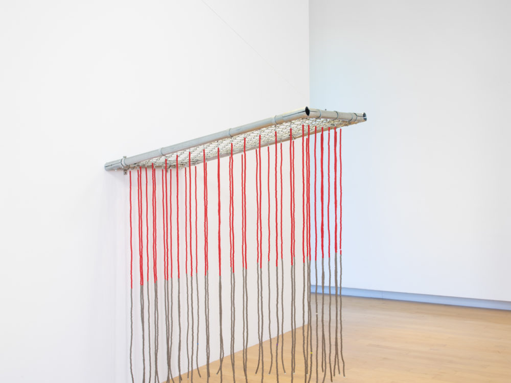 Suspended sculpture with hanging beads