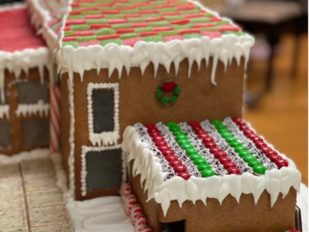 Gingerbread replica of The Aldrich Contemporary Art Museum, featuring a roof made of green and red candies