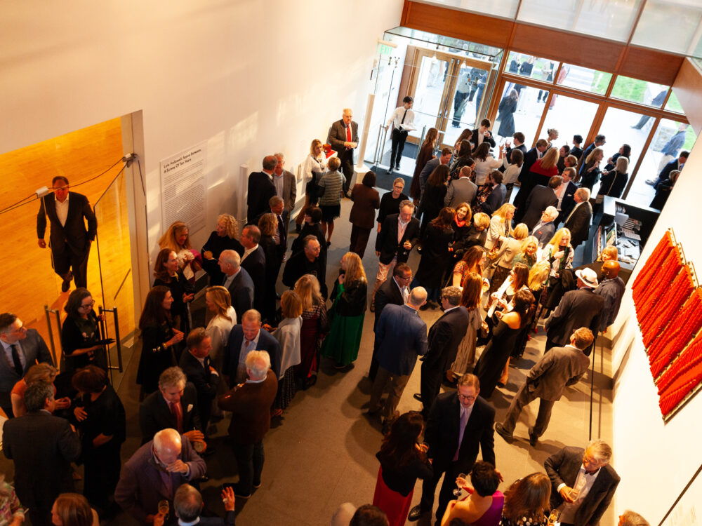 The Museum's atrium from an aerial view full of people.
