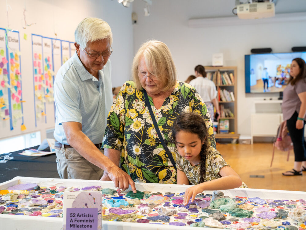 Camper showing her grandparents art