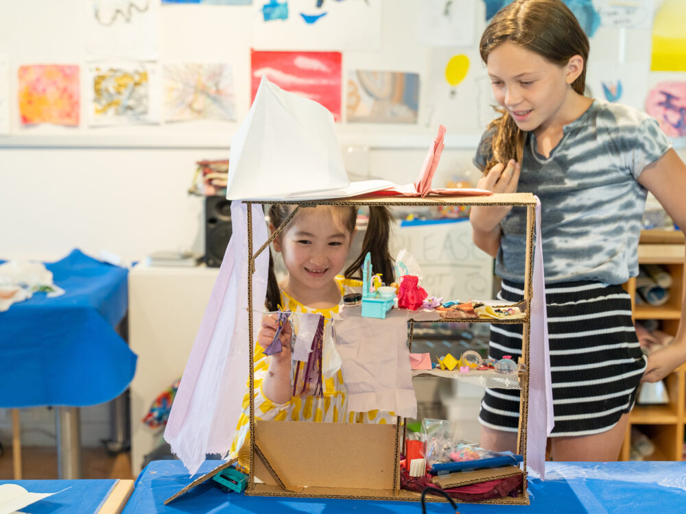 Two Campers making a structural art project