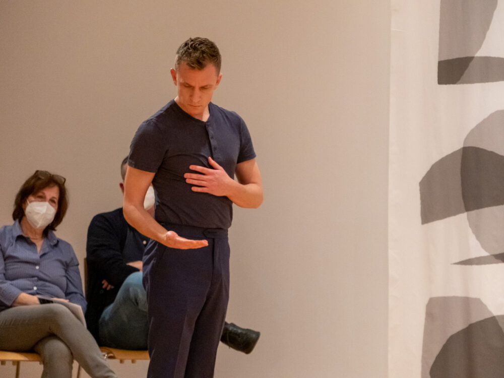 Dancer looking at hands