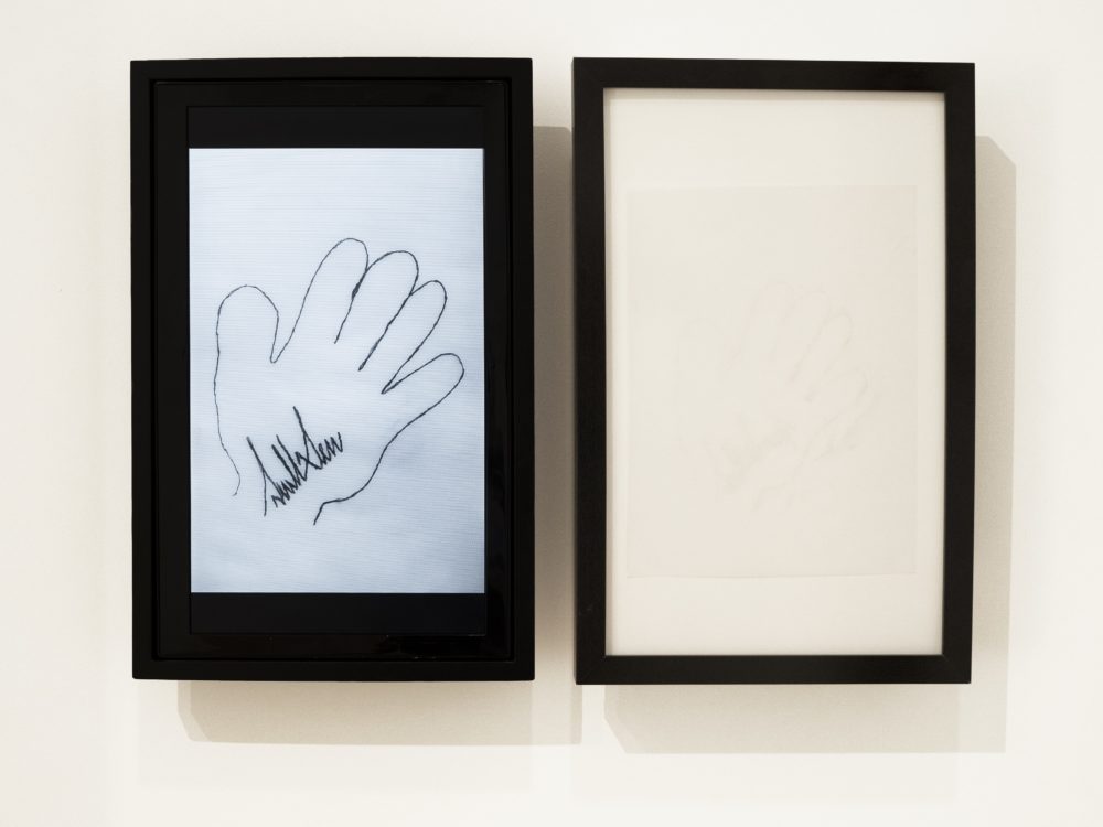 Copy of a drawing by Donald Trump of his right hand with his signature inside.