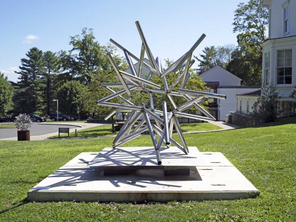 Stainless steel sculpture in form of abstract star by Frank Stella set in the lawn by Main Street in Ridgefield, CT in front of the Museum.