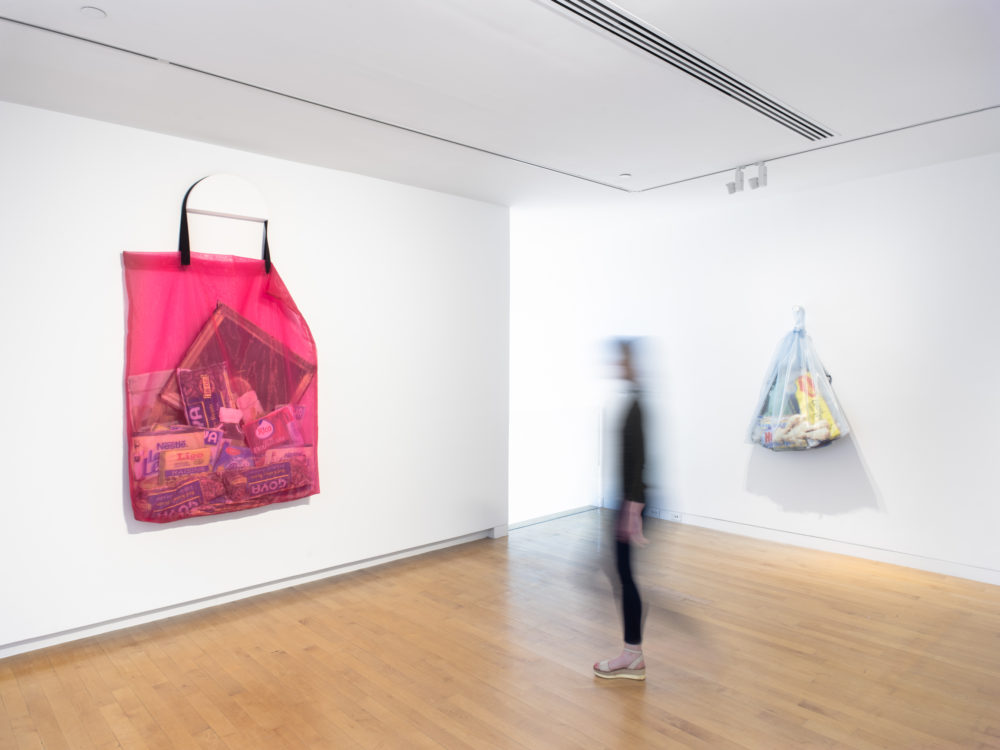 Gallery view of two large mesh bags filled with digitally printed objects
