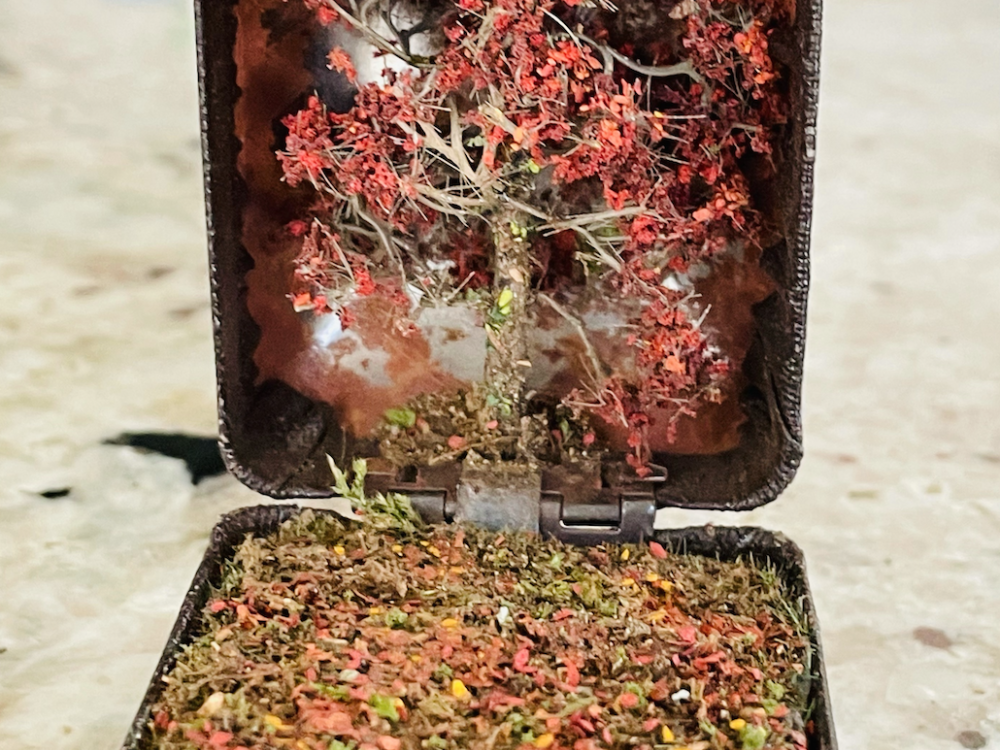 Miniature diorama crafted from a vintage jewelry box