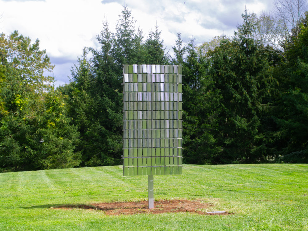 Vertically oriented rectangular kinetic sculpture in the Museum's Sculpture Garden.