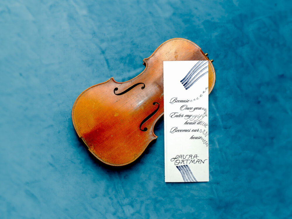 A violin with an illustrated book